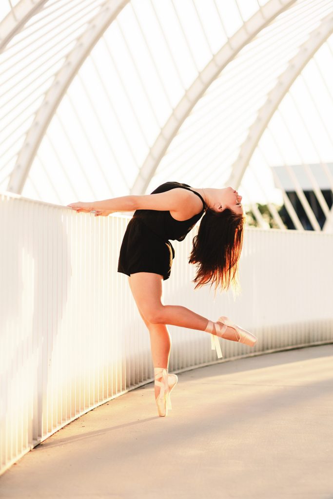 High school senior point shoe dance portrait at florida polytechnic university during a senior photo shoot.