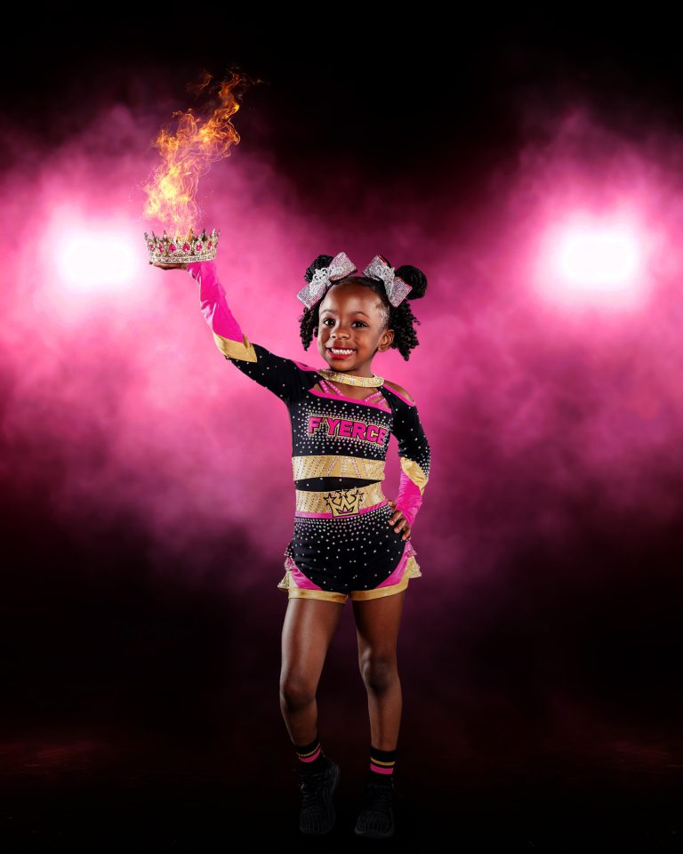 Young all start cheerleader on a dramatic lighting digital background in lakeland, florida