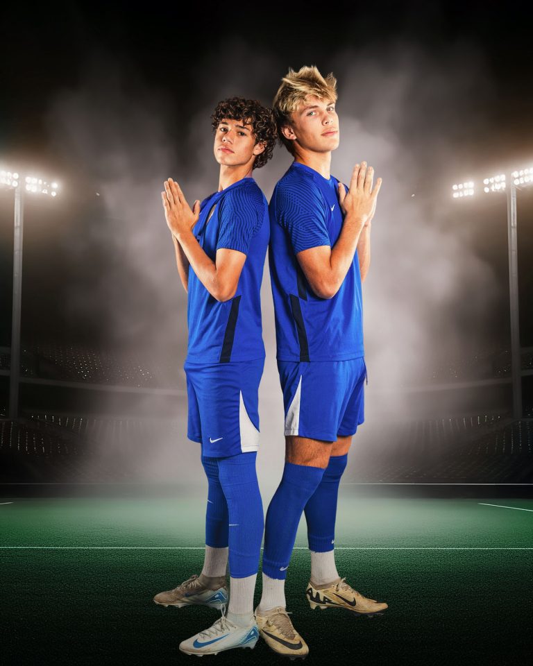 two high school athletes posing for a buddy picture at school photo day