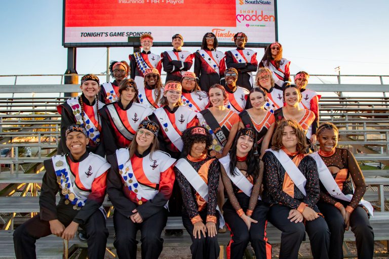 Group of marching band seniors on taken on senior night in lakeland, florida