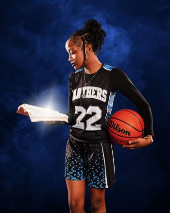 female basketball player image holding a bible in lakeland, florida