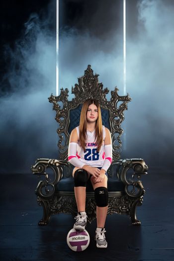 lakeland, florida volleyball player sitting on a digital throne backdrop