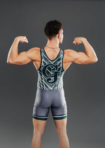 high school wrestler sports portrait on a classic studio grey backdrop