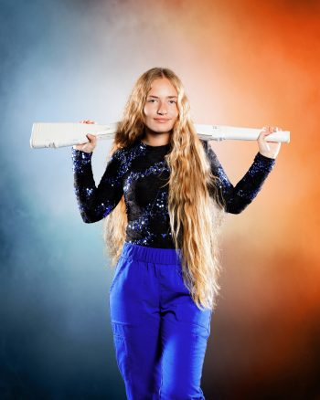 Central florida color guard student holding rifle for senior banner photography