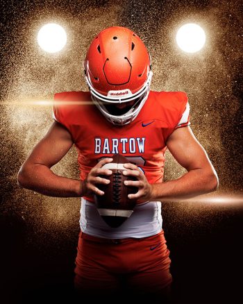 bartow, florida football player with dramatic lighting water spritz digital background