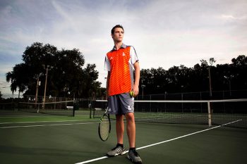 lakeland, florida high school tennis player on tennis court with off camera lighting