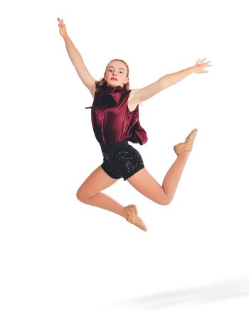 Individual dancer jump pose on a white backdrop