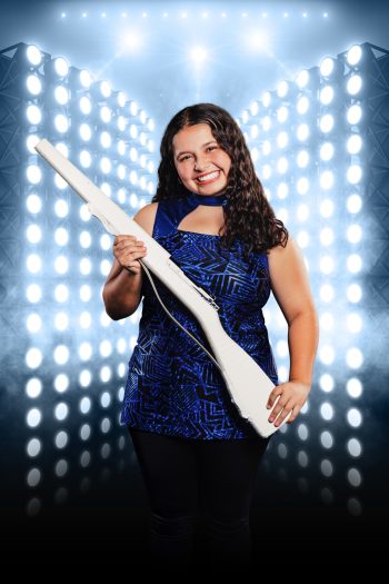 bartow high school color guard posing with her rifle for senior banner photography