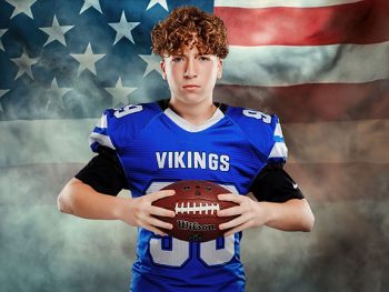Middle school football player posing with a digital American flag background taken in lakeland, florida.