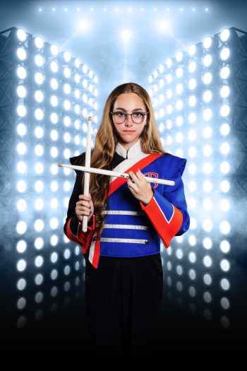 marching band member posing for senior banner photo shoot central florida