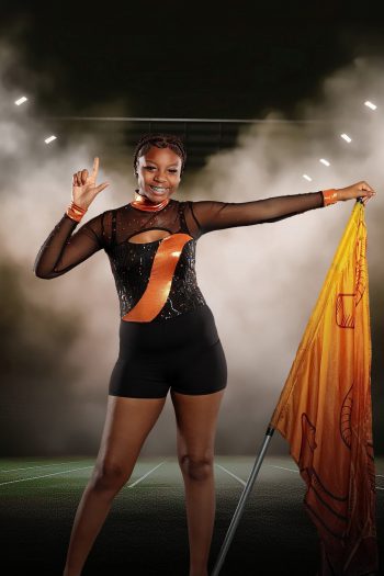 High school color guard flag line student posing for marching band composite print
