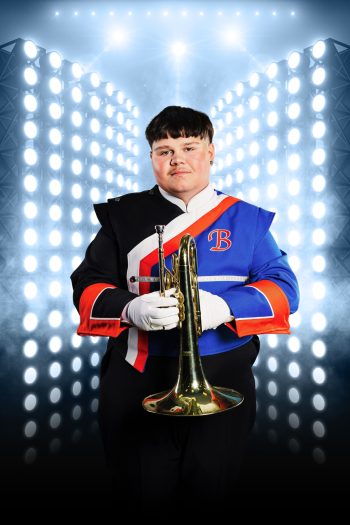 high school marching band individual portrait on digital composite background.