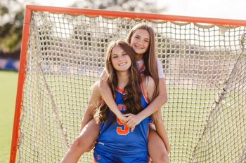 Sibling buddy pose from lacrosse media day central florida