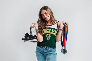 high school senior track athlete portrait taken in the bc visuals bartow, florida studio on a classic white backdrop with studio lighting