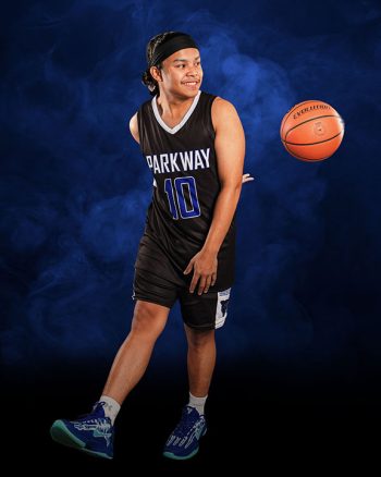 high school basketball player on a digital backdrop taken at a school photo day
