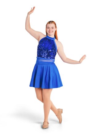 Dance student photographed in a simple white backdrop for a dance studio session.