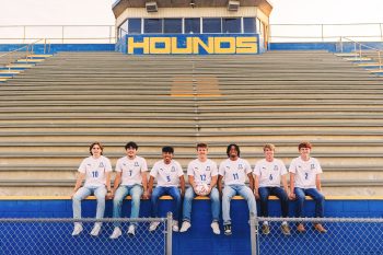 High school soccer seniors posing at the auburndale high school stadium.