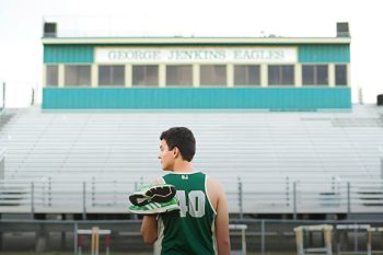high school senior track portrait on home field