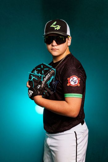 baseball player portrait taken in bartow, florida photography studio using dramatic smoke light