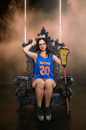 lacrosse player sitting on digital throne backdrop in bartow, florida