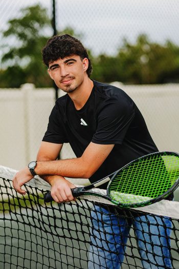 auburndale high school senior tennis player portrait on tennis court