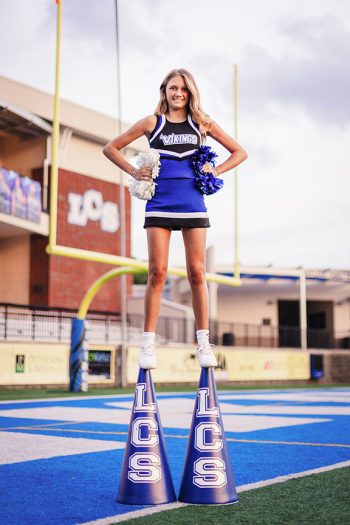 natural light cheer pose at school media day