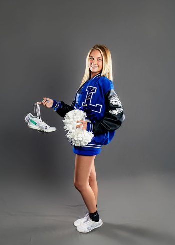 student athlete cheer and cross country portrait in classic studio bartow, florida